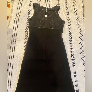 Like New Black dress, Size 4, stretching and shinning